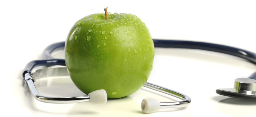 Ernährungsberatung Ausbildung mit einem Apfel und einem Stethoskop für Ernährungsberater GSDS